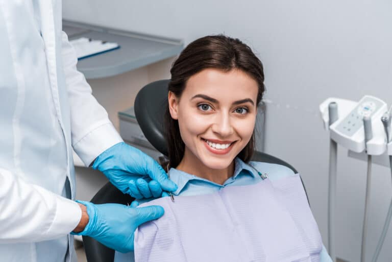 Cropped,View,Of,Man,In,Latex,Gloves,Near,Happy,Woman