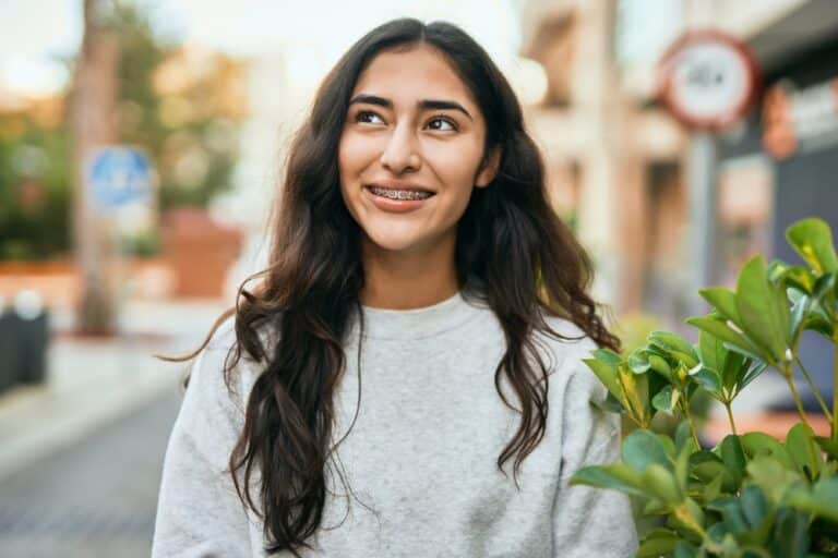 Young,Middle,East,Girl,Smiling,Happy,Standing,At,The,City.